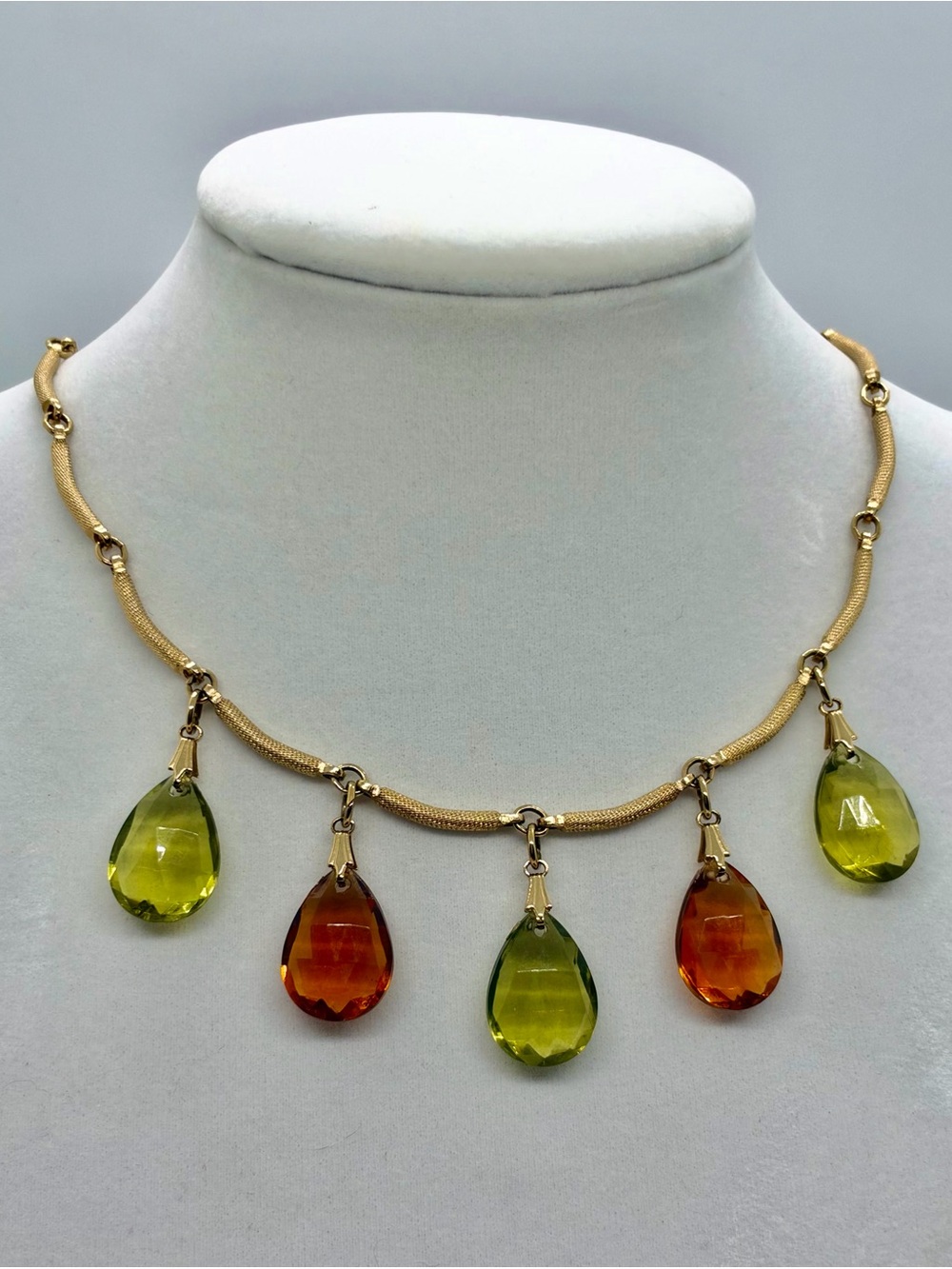 Sarah Coventry “Ember Tears” Tone Necklace with Green and Amber teardrops
